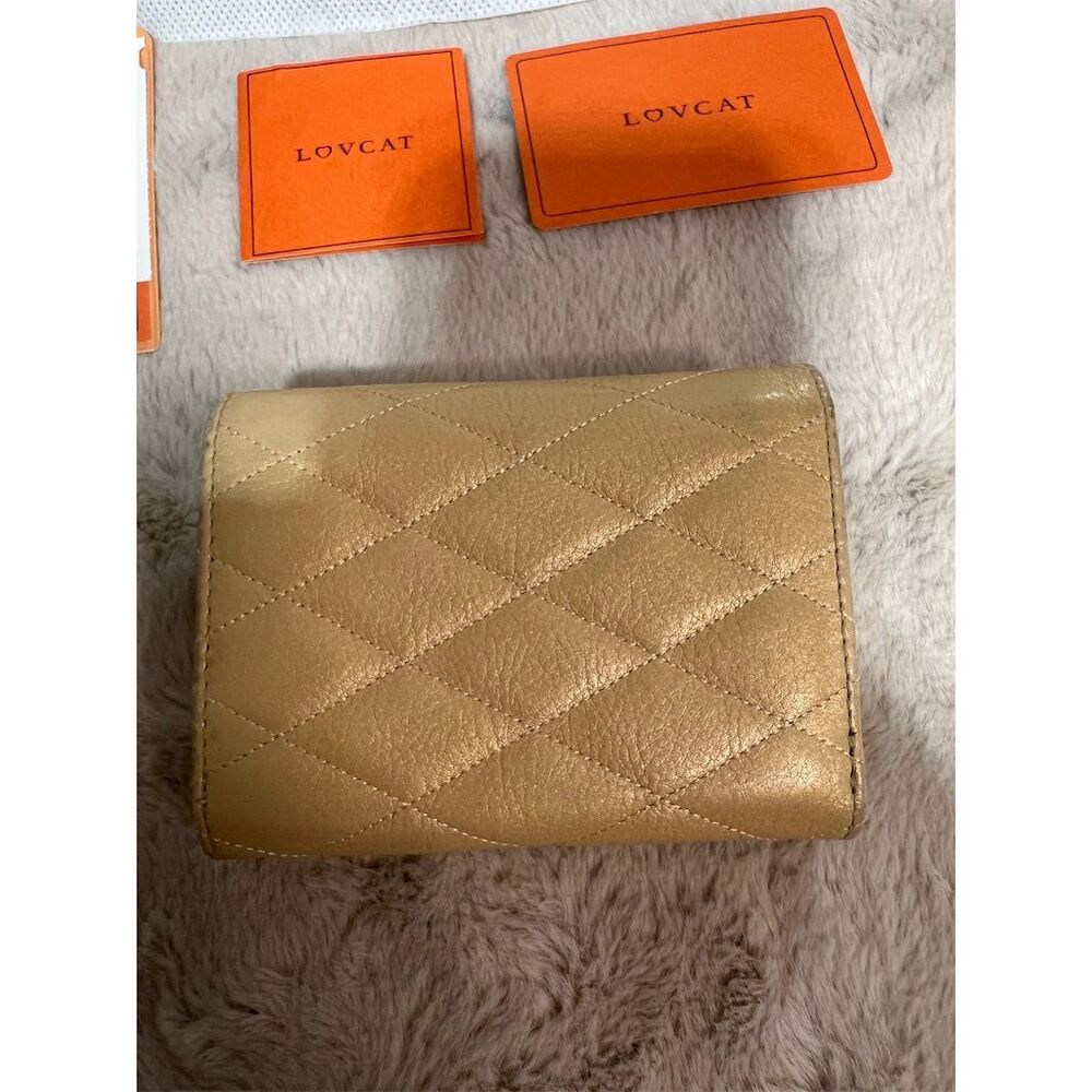 Lovcat Paris Women's Gold Leather Trifold Wallet with Heart Design - Picture 11 of 14